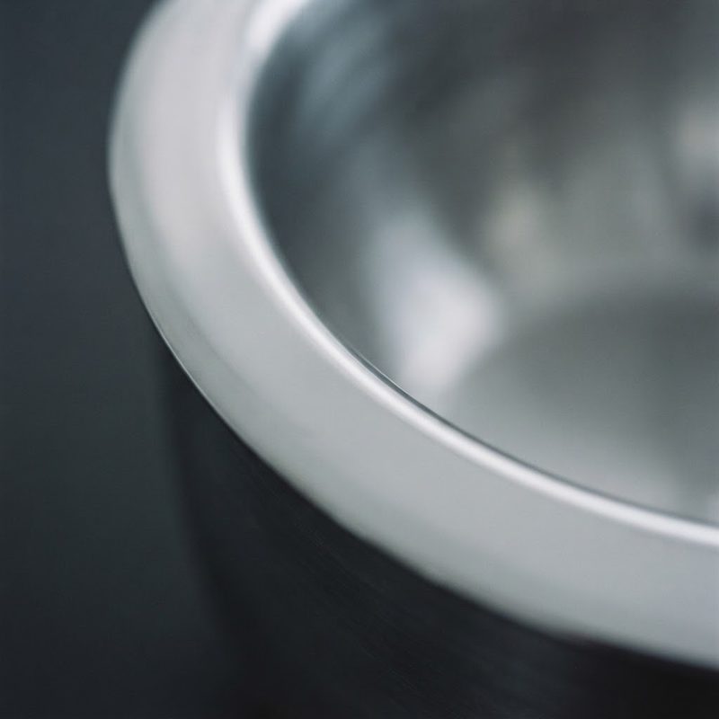 Close-up of a polished stainless steel vessel